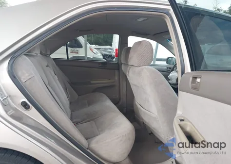 2003 Toyota Camry Le V6 z USA, uszkodzony, nr VIN 4T1BF32K23U056294